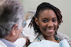 a patient speaking with their orthodontist