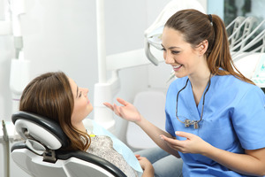 patient talking to an orthodontist